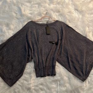 Vertigo, Holiday sweater/blouse.